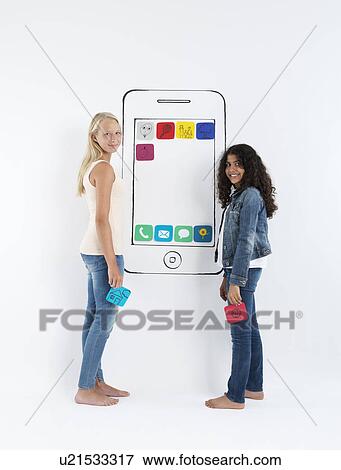Stock Photo - Girls playing with drawing of smartphone. Fotosearch