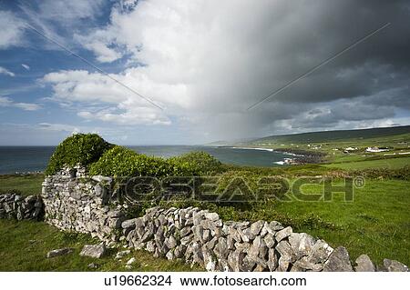 Grass on stone wall in rural landscape View Large Photo Image Picture - Grass on stone wall in rural landscape. Fotosearch