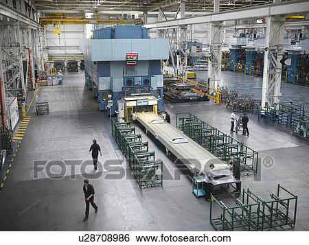 High angle view of car parts press in car factory View Large Photo Image Stock Photograph - High angle view of car parts press in car factory. Fotosearch