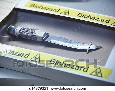 Stock Image - Knife in forensic biohazard box. Fotosearch