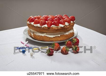 Layer cake with cream and strawberries View Large Photo Image Stock Image - Layer cake with cream and strawberries. Fotosearch