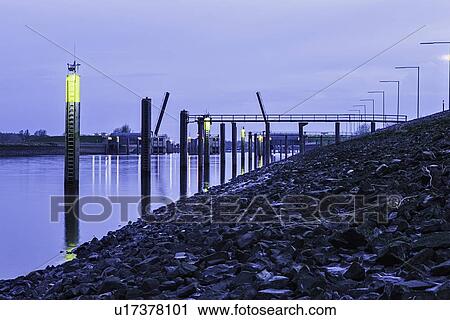 Lights on river lit up at night View Large Photo Image Stock Image - Lights on river lit up at night. Fotosearch