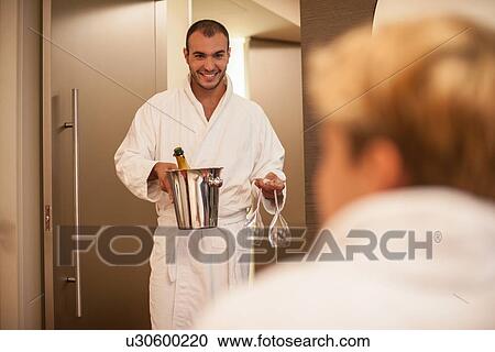 Man bringing girlfriend champagne View Large Photo Image Stock Image - Man bringing girlfriend champagne. Fotosearch