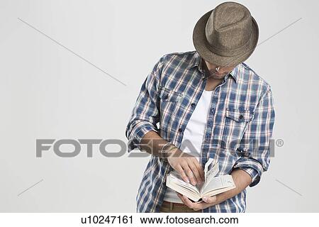 Man reading book View Large Photo Image Stock Image - Man reading book. Fotosearch