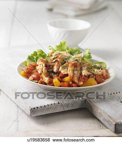 Plate of chicken with pepper salsa View Large Photo Image Stock Photo - Plate of chicken with pepper salsa. Fotosearch