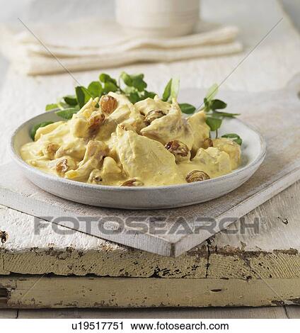 Stock Image - Plate of coronation chicken. Fotosearch