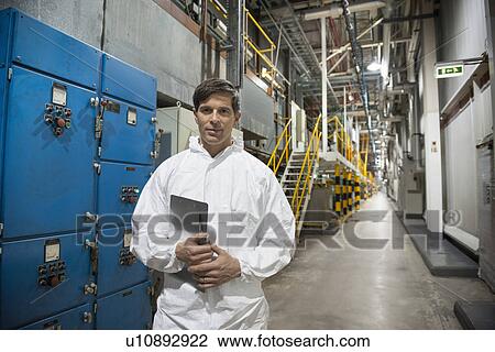 Portrait of spray shop worker in car factory View Large Photo Image Stock Image - Portrait of spray shop worker in car factory. Fotosearch
