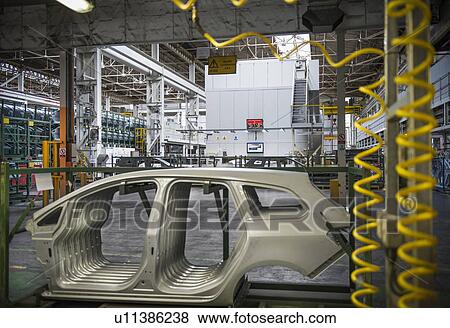 Pressed car parts in car factory View Large Photo Image Stock Photo - Pressed car parts in car factory. Fotosearch