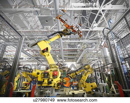 Stock Photo - Robots in car factory. Fotosearch