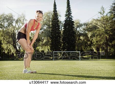 Runner resting in park View Large Photo Image Stock Photo - Runner resting in park. Fotosearch