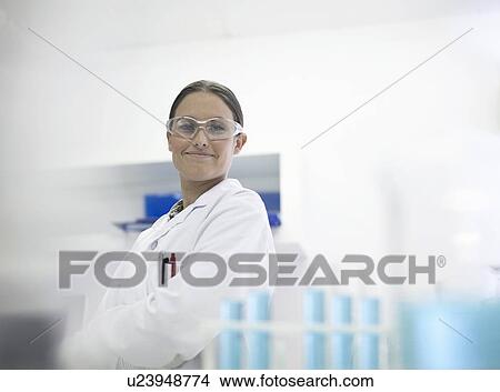Picture - Scientist smiling in lab. Fotosearch