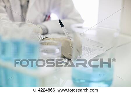 Scientist working in lab View Large Photo Image Stock Photograph - Scientist working in lab. Fotosearch