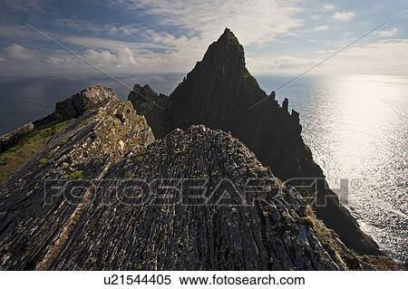 Silhouette of coastal rock formations View Large Photo Image Stock Photography - Silhouette of coastal rock formations. Fotosearch
