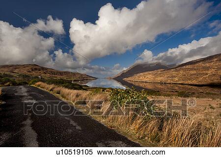 Sky reflected in still rural lake View Large Photo Image Stock Photography - Sky reflected in still rural lake. Fotosearch