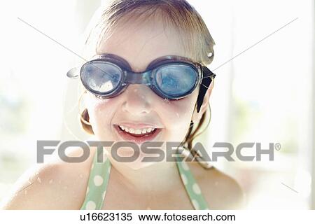 Smiling girl wearing goggles View Large Photo Image Stock Photography - Smiling girl wearing goggles. Fotosearch
