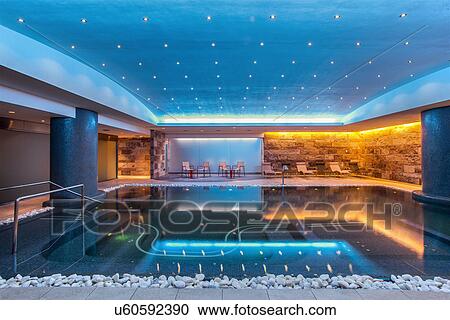 Stock Image - Still modern indoor pool. Fotosearch