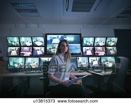 Student sitting in forensic screen room View Large Photo Image Stock Image - Student sitting in forensic screen room. Fotosearch