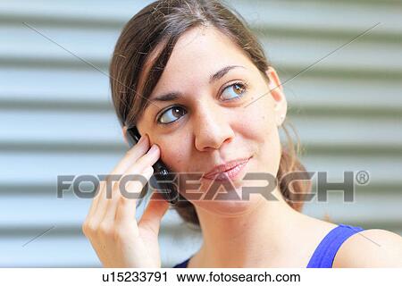 Teenage girl talking on cell phone View Large Photo Image Stock Image - Teenage girl talking on cell phone. Fotosearch