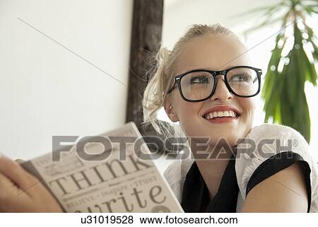 Stock Photo - Teenage girl writing in journal. Fotosearch