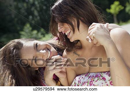 Teenage girls smiling outdoors View Large Photo Image Picture - Teenage girls smiling outdoors. Fotosearch