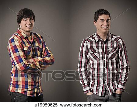 Stock Photography - Two smiling men posing for portrait. Fotosearch