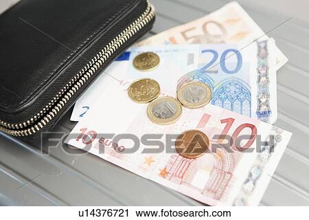 Wallet with euro notes and coins View Large Photo Image Stock Image - Wallet with euro notes and coins. Fotosearch