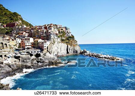 Waves crashing on banks of coastal city View Large Photo Image Stock Image - Waves crashing on banks of coastal city. Fotosearch