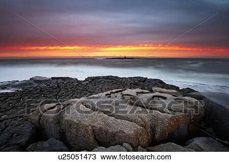 Waves washing up on rock formations View Large Photo Image Stock Image - Waves washing up on rock formations. Fotosearch