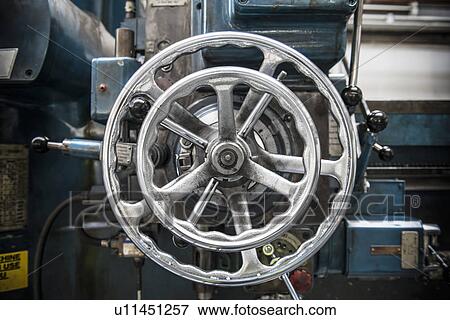 Wheel on lathe in car factory View Large Photo Image Stock Photo - Wheel on lathe in car factory. Fotosearch