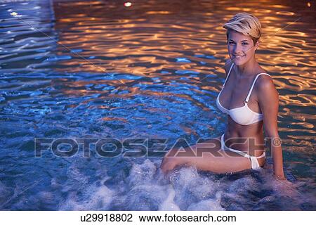Woman relaxing in indoor jacuzzi View Large Photo Image Stock Image - Woman relaxing in indoor jacuzzi. Fotosearch
