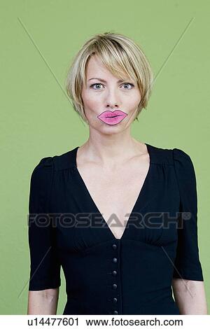 Woman wearing fake lips View Large Photo Image Stock Image - Woman wearing fake lips. Fotosearch