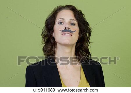 Woman wearing fake mustache View Large Photo Image Stock Photo - Woman wearing fake mustache. Fotosearch