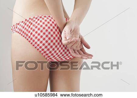 Woman wearing patterned underwear View Large Photo Image Picture - Woman wearing patterned underwear. Fotosearch