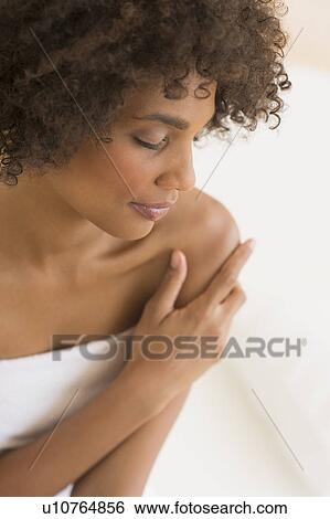Stock Photograph - Beauty portrait of woman, studio shot. Fotosearch