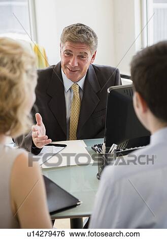 Business meeting in office View Large Photo Image Stock Photograph - Business meeting in office. Fotosearch