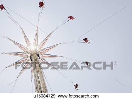 Carousel in amusement park View Large Photo Image Stock Photo - Carousel in amusement park. Fotosearch