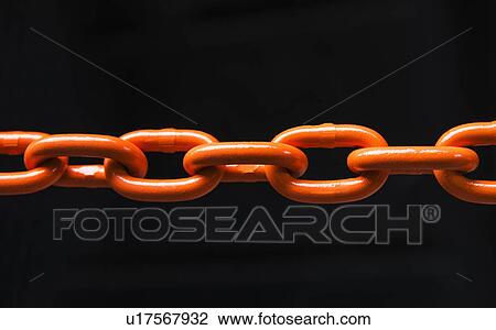 Stock Image - Chain on black background, studio shot. Fotosearch