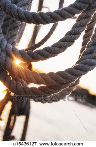 Close-up view of ropes on yacht deck View Large Photo Image Stock Photo - Close-up view of ropes on yacht deck. Fotosearch