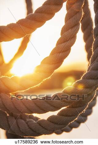 Close-up view of ropes on yacht deck View Large Photo Image Stock Photograph - Close-up view of ropes on yacht deck. Fotosearch