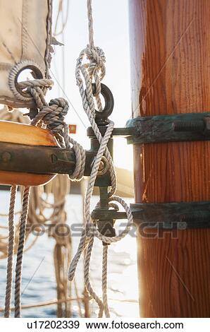 Close-up view of yacht ropes, boom and main mast View Large Photo Image Stock Photo - Close-up view of yacht ropes, boom and main mast. Fotosearch