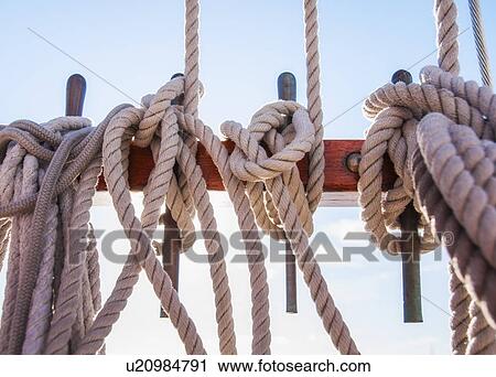 Coiled ropes on yacht deck View Large Photo Image Stock Image - Coiled ropes on yacht deck. Fotosearch