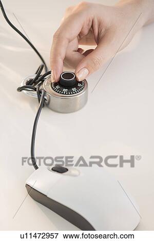 Computer mouse closed with combination lock View Large Photo Image Stock Photo - Computer mouse closed with combination lock. Fotosearch