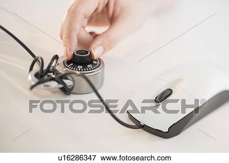 Computer mouse closed with combination lock View Large Photo Image Stock Photo - Computer mouse closed with combination lock. Fotosearch