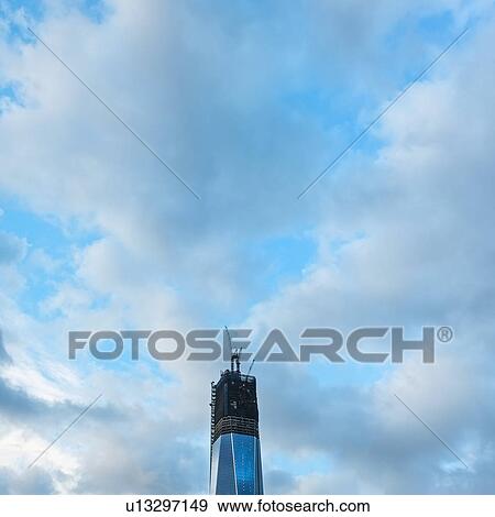 Stock Photo - Construction site and cloudy sky. Fotosearch