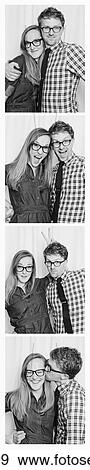 Couple in photo booth View Large Photo Image Stock Photo - Couple in photo booth. Fotosearch
