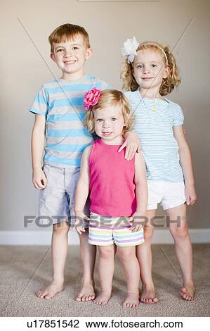 Familly portrait of three siblings View Large Photo Image Stock Image - Familly portrait of three siblings. Fotosearch