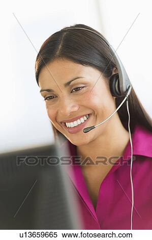 Stock Photography - Female telephone worker. Fotosearch