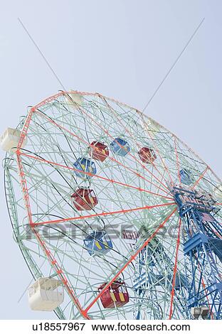 Ferris wheel in amusement park View Large Photo Image Stock Photo - Ferris wheel in amusement park. Fotosearch