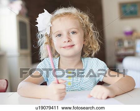 Girls portrait at table View Large Photo Image Stock Image - Girls portrait at table. Fotosearch