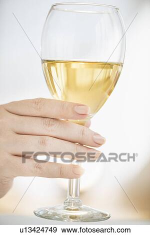 Stock Photo - Glass with white wine. Fotosearch